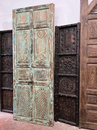  Artisan-Carved Sliding Barn Doors: Elevate Your Space with Vintage Elegance