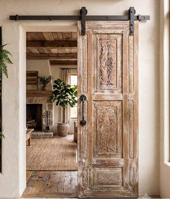 whitewashed carved door