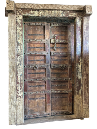  Reviving the Vintage Charm of Carved Wooden Doors | Mogulinterior
