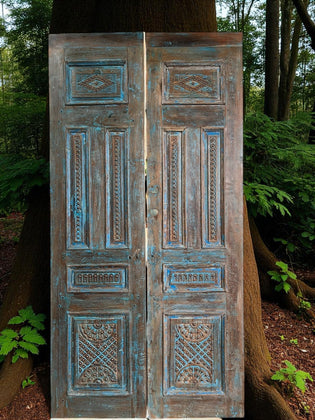  Blue Notes: The Art of Color Therapy and Carved Doors in the Home Library