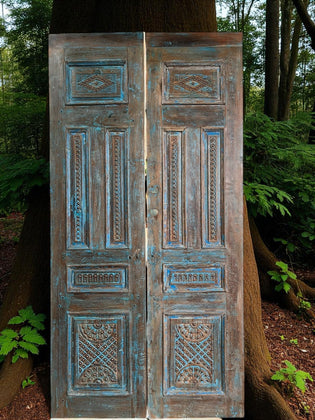  Blue Notes: The Art of Color Therapy and Carved Doors in the Home Library