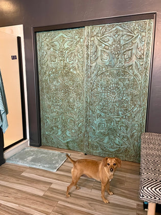  Vintage Armoires & Carved Doors Redefine Coastal Farmhouse Interiors