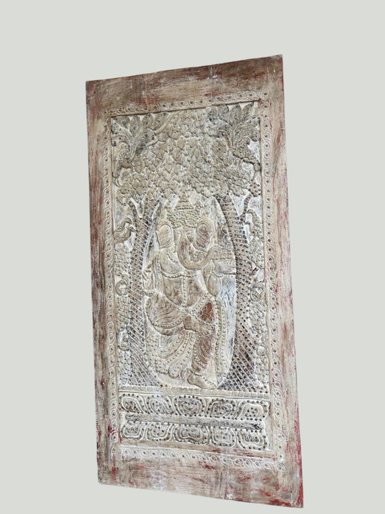 Decorative wooden panel with ganesha carving 
