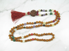 Harness the cosmic energy of the nine planets (Navgraha) with this handmade meditation mala, designed for healing, balance, and spiritual growth. 