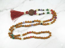 Harness the cosmic energy of the nine planets (Navgraha) with this handmade meditation mala, designed for healing, balance, and spiritual growth. 