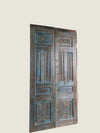 Vintage wooden doors with intricate carvings 
