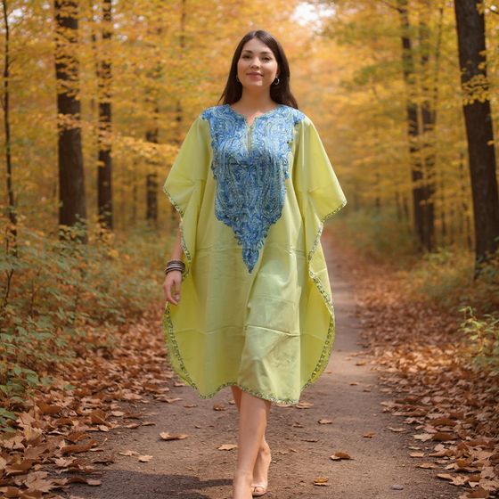 Women's Lemoncello Caftan Dress, perfect for summer parties and other occasions. Made of comfortable, breathable cotton and featuring floral embroidery on the neck and cuffs, this oversized tunic-style dress effortlessly blends comfort with sophistication