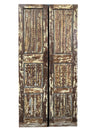 Pair of ornate wooden doors with intricate carvings on a white background