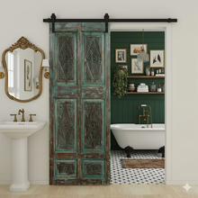  Vintage Carved Barn Door in a beautifully distressed blue finish. Handcrafted from reclaimed wood, this one-of-a-kind piece features intricate carvings and weathered textures that tell a story of age and artistry. Perfect as a sliding barn door, wall panel, or statement entry piece, this rustic blue door brings character and warmth to any space.
