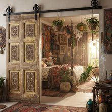  carved double doors with brass studs