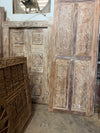 Rustic Hand-Carved Wooden Doors