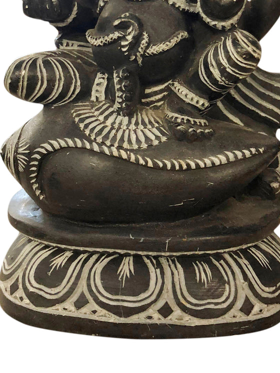 Ganesha Sitting on Conch Shell Stone Statue