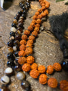 Protecting against negativity: evil eye pendant necklace, Rudraksha Mala