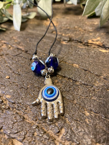  Protecting against negativity: evil eye pendant necklace, Rudraksha Mala