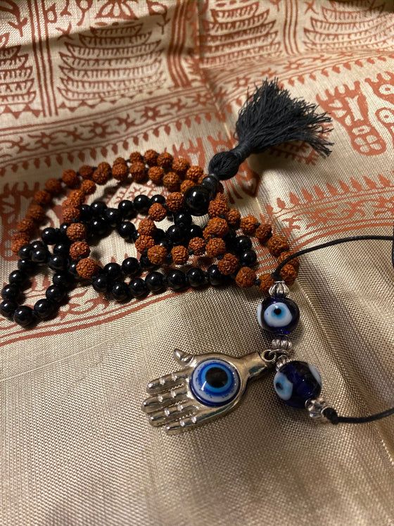 Protecting against Negativity: Evil eye Pendant necklace, Rudraksha Black